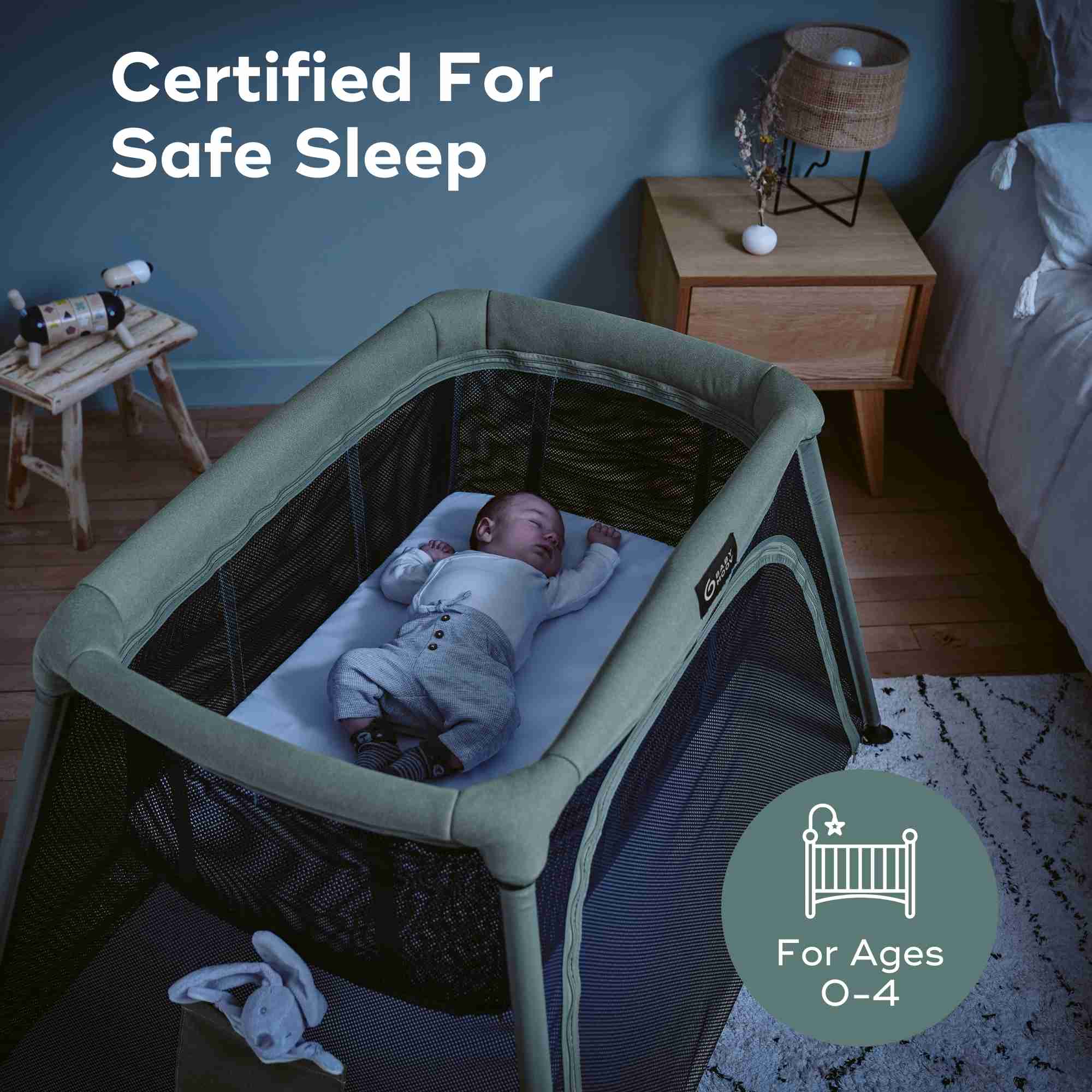 Baby lying in a certified safe sleep crib in a bedroom setting.